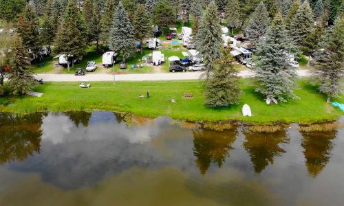 An aerial view of a rv campground near Rainbow Lake.